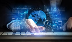 Business woman typing on keyboard with global system concept Business woman typing on keyboard with global system concept